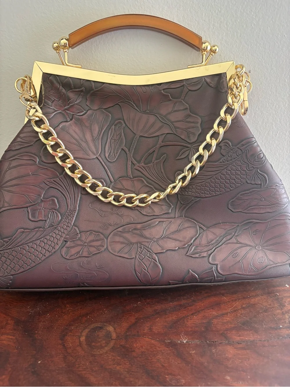 Vintage-Inspired Embossed Brown Leather Top-Handle Bag with Gold Chain